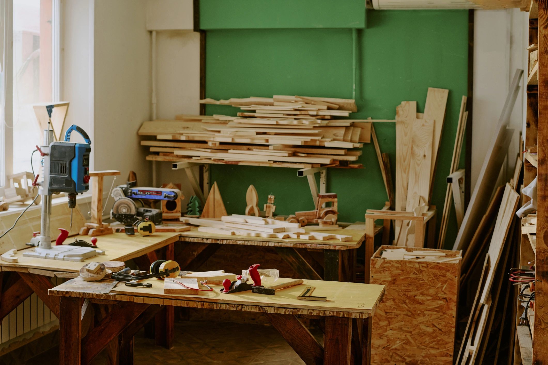 Woodworking studio with lumber and tools