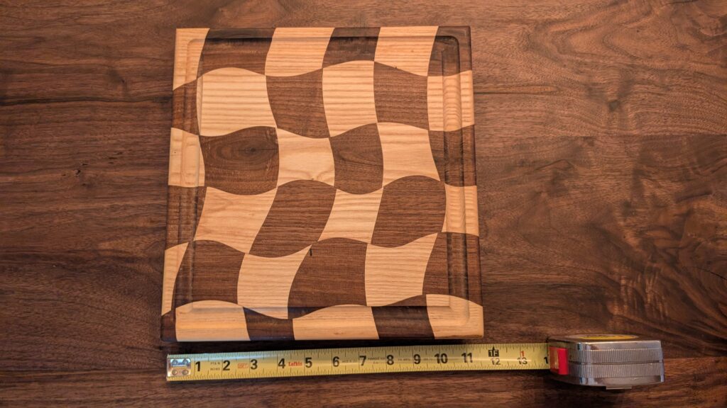 Black Walnut and Ash decorative wavy cutting board